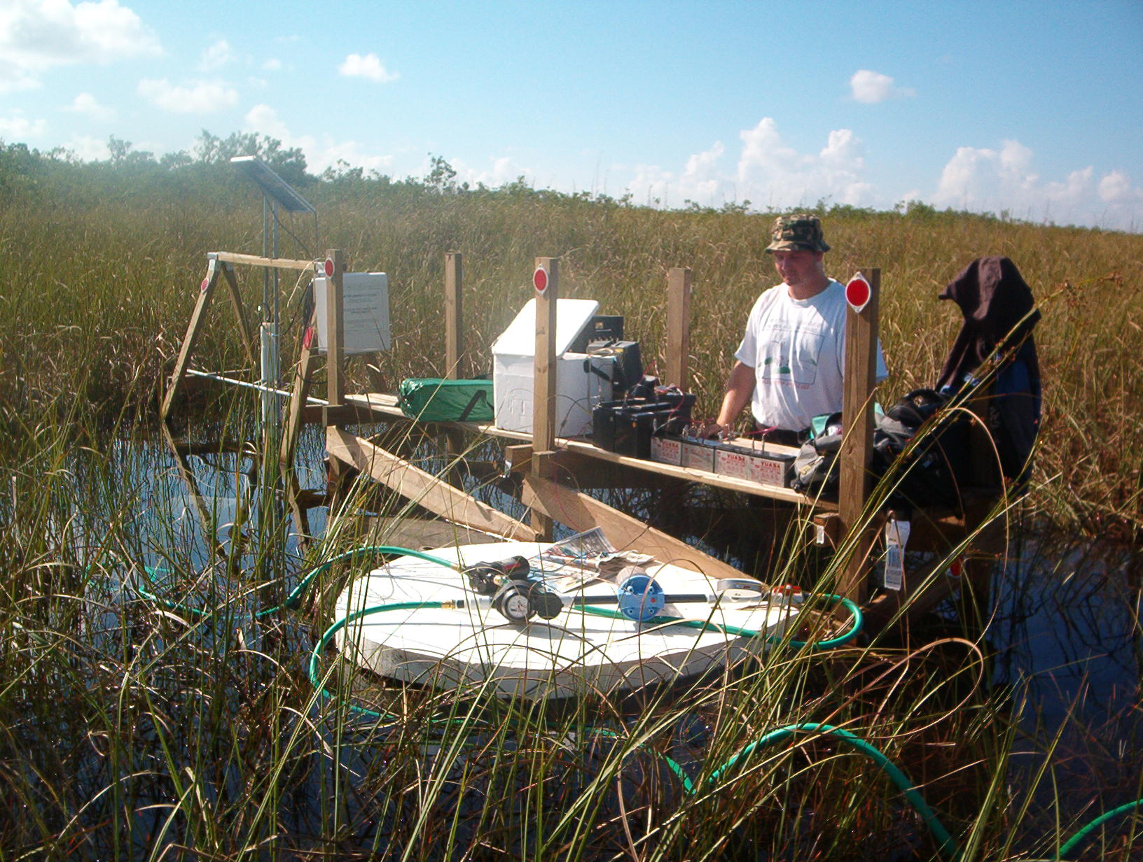 Gary Jacobi collecting suspended solids samples